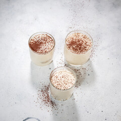 Traditional Italian dessert tiramisu in a glass
