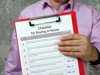 Business concept about Checklist for Buying a House with phrase on the sheet.