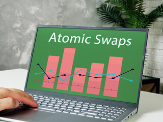  Atomic Swaps sign on the piece of paper.