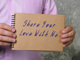 Lifestyle concept meaning Share Your Love With Me with sign on the piece of paper.