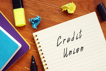 Business concept about Credit Union with sign on the sheet.