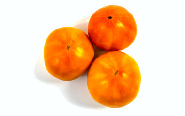 Stock Foto Closeup of yellow orange tomato isolated on white background
