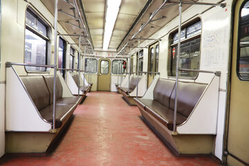 Subway car with empty seats. Empty subway.