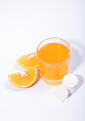 Vitamin c effervescent tablet in the water on white background, vitamin c remedy for COVID-19