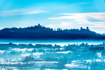 Fototapeta na wymiar castles in the snow and fog three