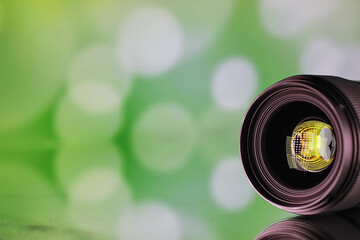 Equipment videographer and photographer. Lenses on the table against the background of bright...