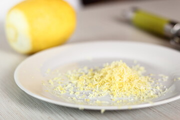 Grated lemon rind in plate. Making Chicken and Egg Galette Series.