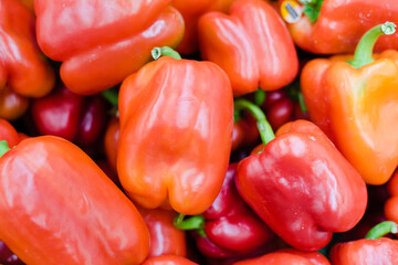 red and yellow peppers, red pepper background