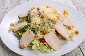 Caesar salad with chicken breast