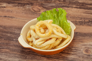Roasted squid rings with salad