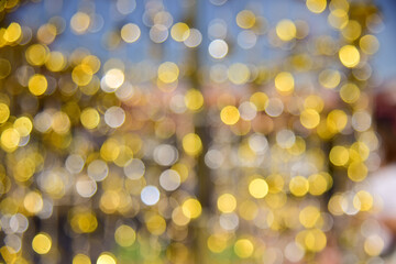Blurred bokeh light gold background.