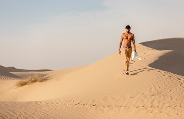 a man in a desert at surise