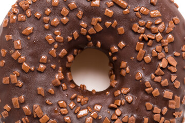 Chocolate donut on a white background close-up.