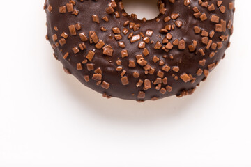 Chocolate donut on a white background close-up.