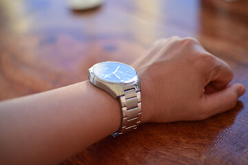Fototapeta premium Businessman looking at his watch.