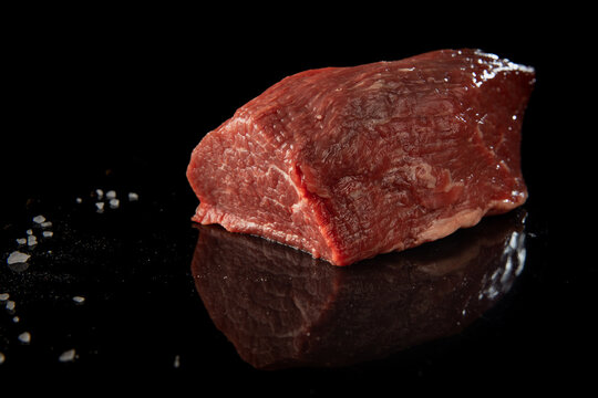 raw uncooked piece of meat