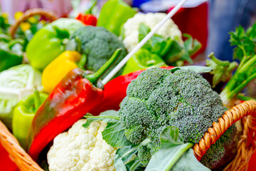 Various vegetables in basket for sale, available at flea market