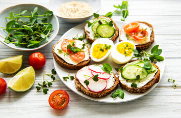 Sandwiches with healthy vegetables and micro greens