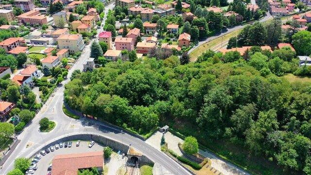 A drone shot of the village of Canzo with the church near lake Como in Italy
