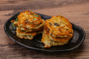 Zucchini pancakes with herbs and spices