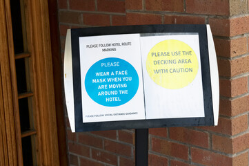 Hotel safe rules sign at entrance for covid-19