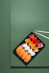 Japanese food concept to go. Sushi take away assortment