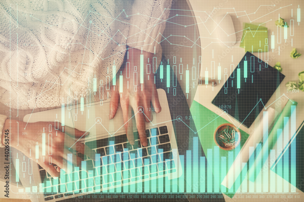 Poster multi exposure of woman hands working on computer and forex chart hologram drawing. top view. financ