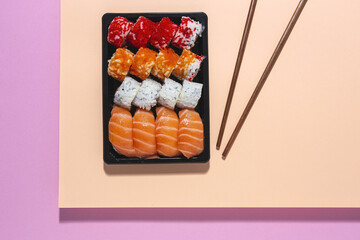 Japanese food concept to go. Sushi take away assortment