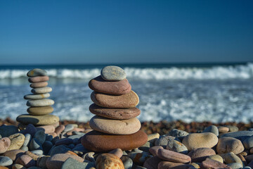 pyramid of stones with sea view