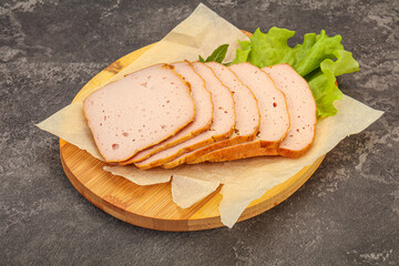 Boiled pork sausage over board