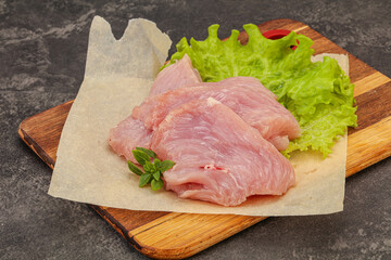 Raw turkey breast steak for cooking