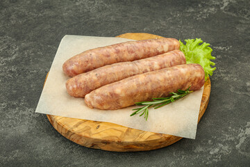 Raw pork meat sausages for grill