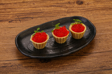 Apetizer - tartlet with red caviar