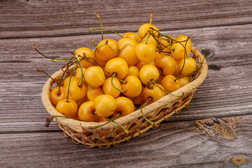 Sweet ripe yellow cherry heap
