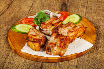 Grilled pork shashlick served vegetables