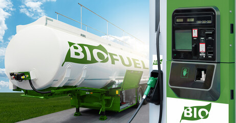 Tank trailer with biofuel and filling station on the background of a green field and blue sky