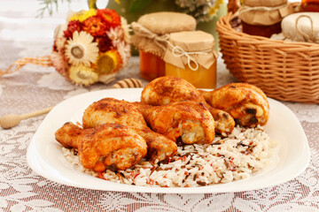 Indian cuisine: roasted chicken with rice and vegetables.