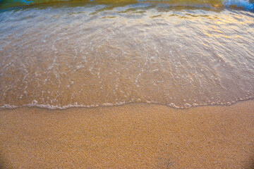 Sea wave beach sunset light