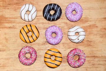 multicolored donuts yellow pink chocolate