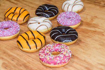multicolored donuts yellow pink chocolate