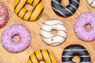 multicolored donuts yellow pink chocolate
