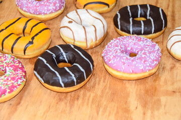 multicolored donuts yellow pink chocolate