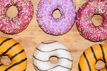 multicolored donuts yellow pink chocolate