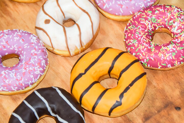 multicolored donuts yellow pink chocolate