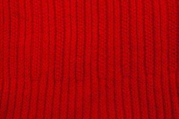 Red wool knitted canvas, ribs, tricot, hand knit, elastic, clouseup, horizontal photo