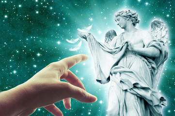 woman hand touching guardian angel or archangel with divine rays of light