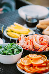Traditional Snacks Of Mediterranean Cuisine. Shrimps And Oranges