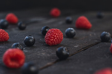 Fresh organic blueberries and raspberries in a basket.Blueberry and raspberry.Healthy eating,diet concept