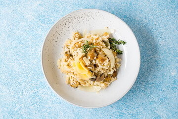 Risotto with white mushrooms and wine, top view