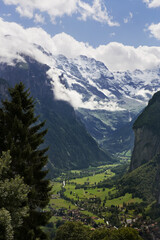 The spectacular Lauterbrunnen valley with the Lauterbrunnen Wall blocking the head of the valley, Bernese Oberland, Switzerland, from Wengwald